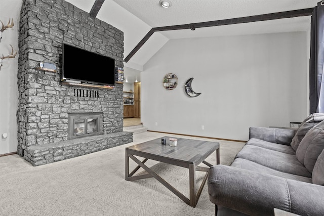 living room with carpet floors, a fireplace, lofted ceiling, and a textured ceiling