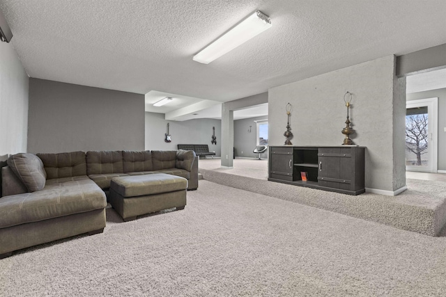 living room with carpet and a textured ceiling