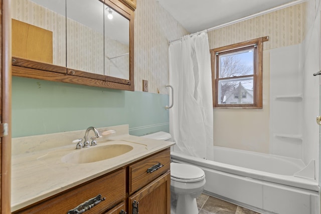 full bathroom with vanity, toilet, and shower / bath combo with shower curtain