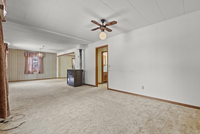 unfurnished living room with ceiling fan and light carpet