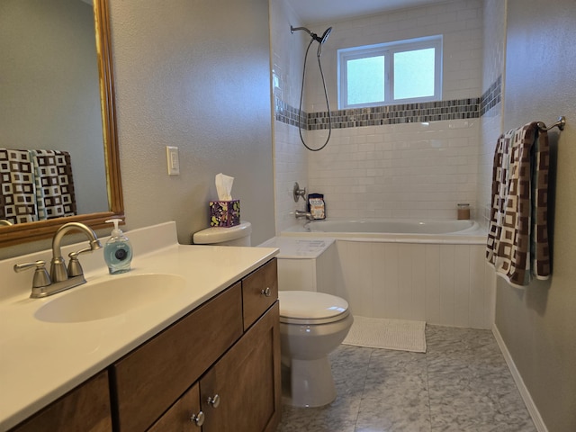 full bathroom with tiled shower / bath, vanity, toilet, and tile patterned flooring