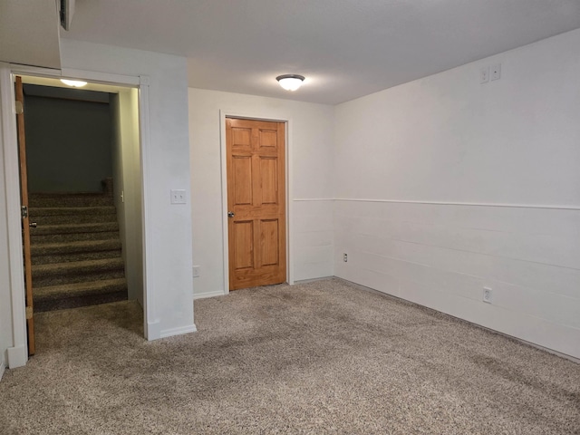 unfurnished room with carpet floors