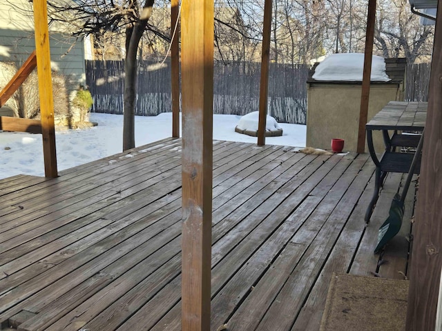 view of snow covered deck