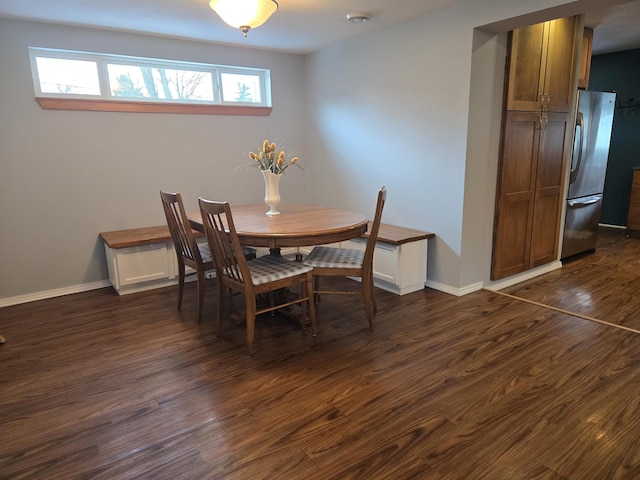 dining room featuring dark hardwood / wood-style flooring