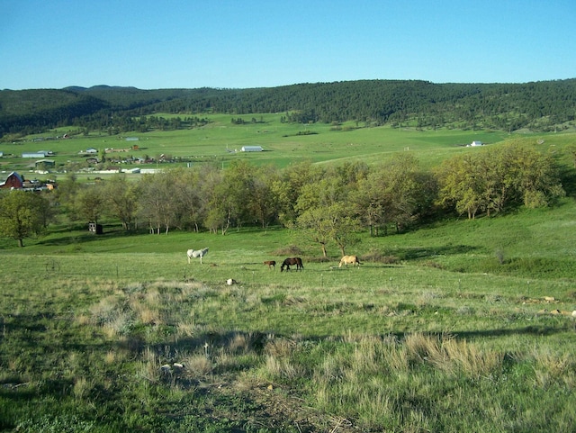 property view of mountains featuring a rural view