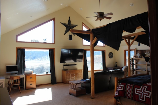 carpeted living room with baseboards, high vaulted ceiling, and ceiling fan