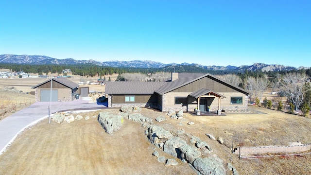 view of front of home with a mountain view