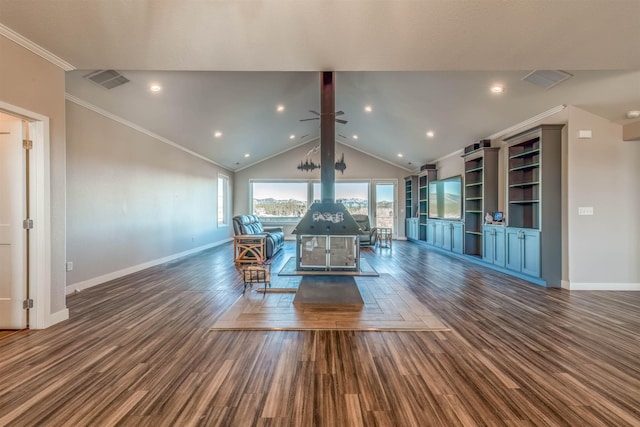 unfurnished living room with lofted ceiling with beams, crown molding, and dark hardwood / wood-style floors