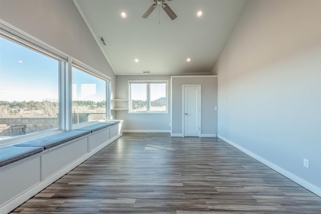 unfurnished sunroom featuring vaulted ceiling and ceiling fan