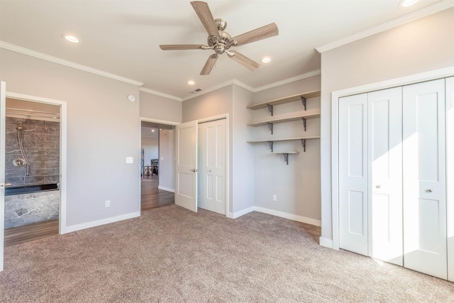 unfurnished bedroom featuring ceiling fan, ornamental molding, connected bathroom, and carpet floors