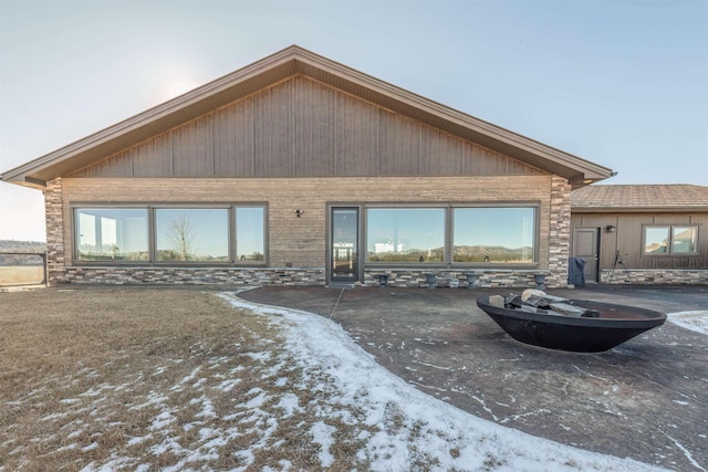 view of snow covered house