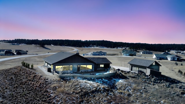 view of aerial view at dusk