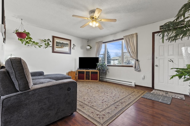 living room with dark wood-type flooring, a baseboard radiator, ceiling fan, and a textured ceiling