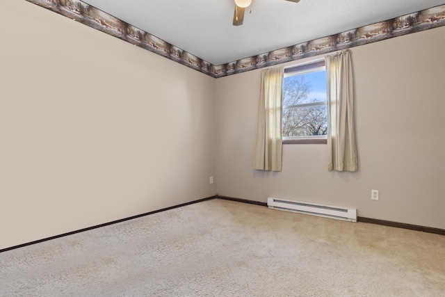 unfurnished room featuring a baseboard radiator, light carpet, and ceiling fan