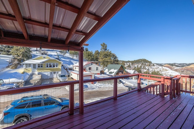 view of snow covered deck