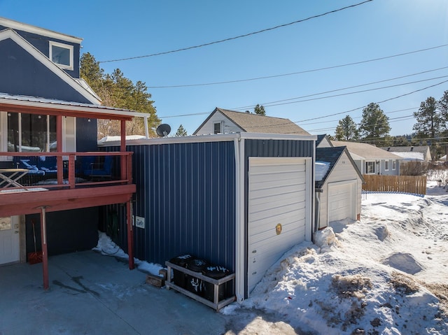 view of snow covered garage