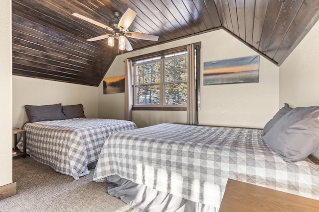 carpeted bedroom with wood ceiling, vaulted ceiling, and ceiling fan