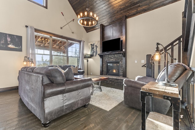 living room with a stone fireplace, an inviting chandelier, high vaulted ceiling, wooden ceiling, and dark hardwood / wood-style floors