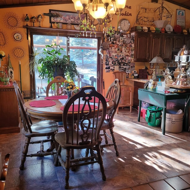 dining space featuring a chandelier