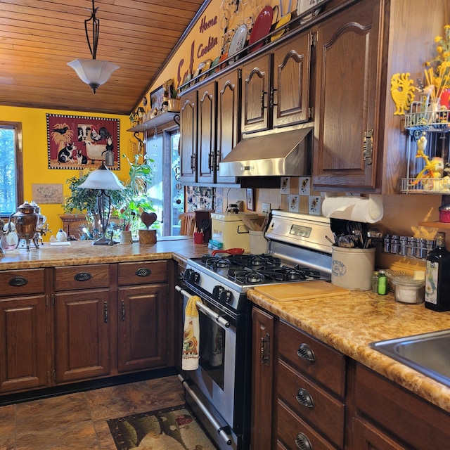 kitchen featuring extractor fan, vaulted ceiling, hanging light fixtures, wood ceiling, and gas range