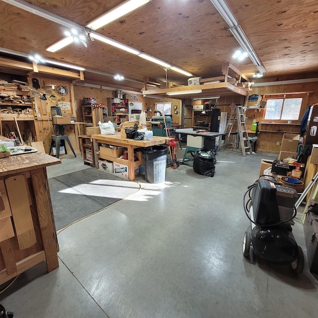 garage with a workshop area