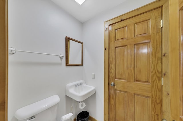 bathroom featuring toilet