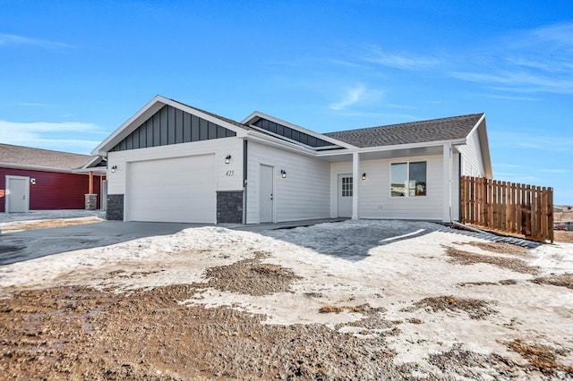 single story home featuring a garage