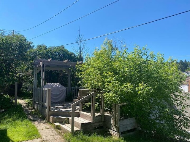 exterior space featuring a pergola