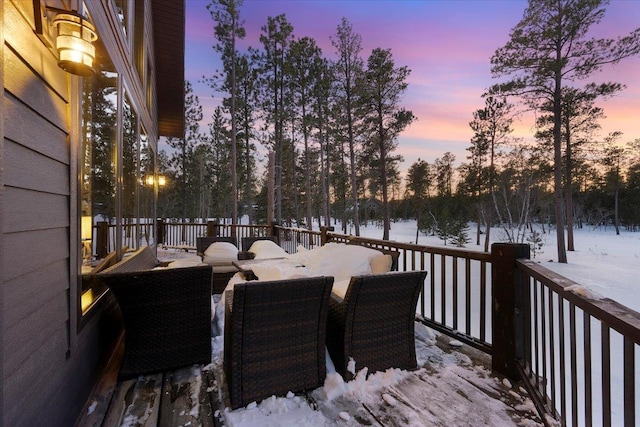 view of snow covered deck