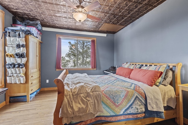 bedroom with light wood-type flooring