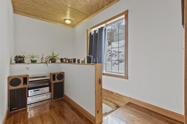 interior space featuring wood ceiling and dark hardwood / wood-style flooring