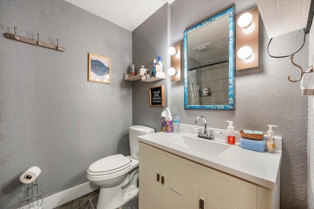 bathroom with a shower with curtain, vanity, and toilet