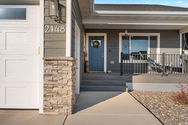 doorway to property featuring a porch