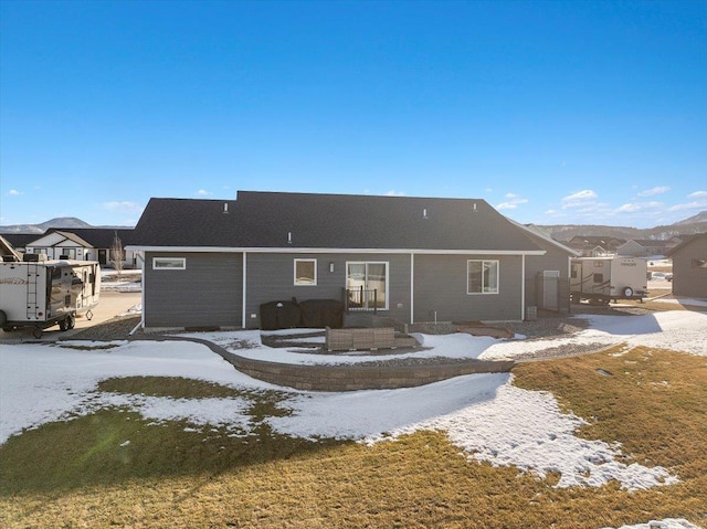 view of snow covered property