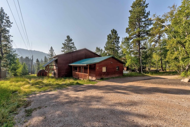 view of home's exterior with a mountain view