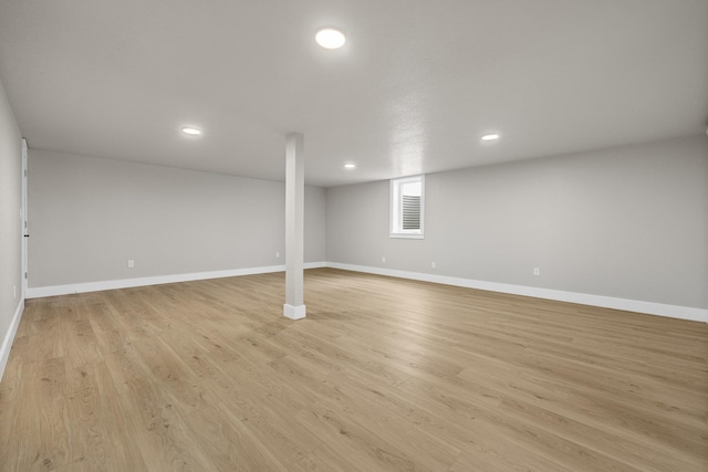 basement featuring light wood-type flooring