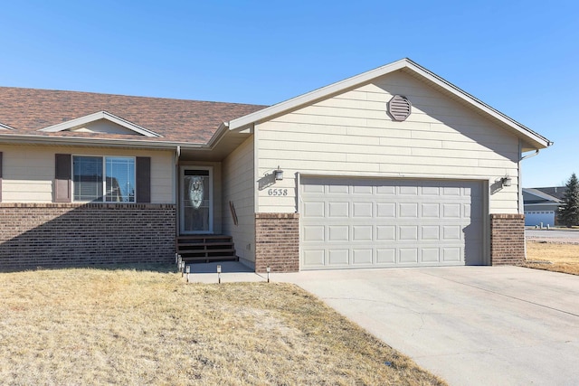 ranch-style home with a garage