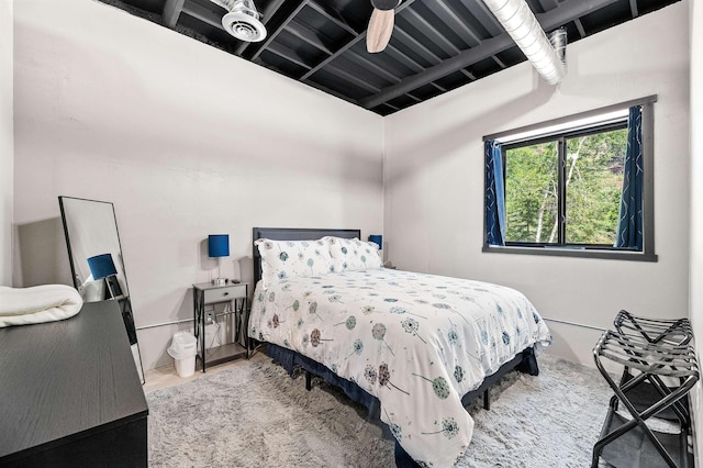 bedroom featuring wood-type flooring