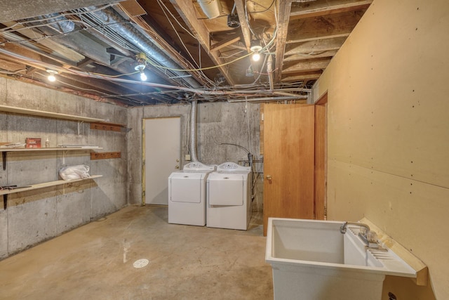 basement featuring washing machine and clothes dryer