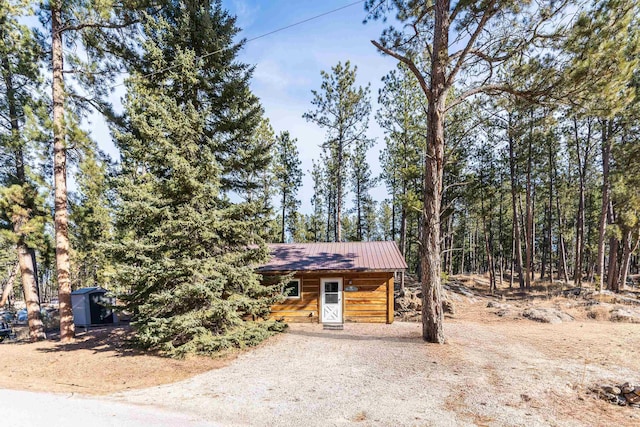 cabin with a shed