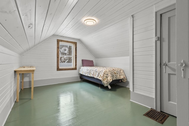 bedroom featuring hardwood / wood-style flooring, lofted ceiling, wooden walls, and wooden ceiling