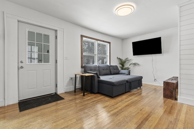 living room with light hardwood / wood-style floors