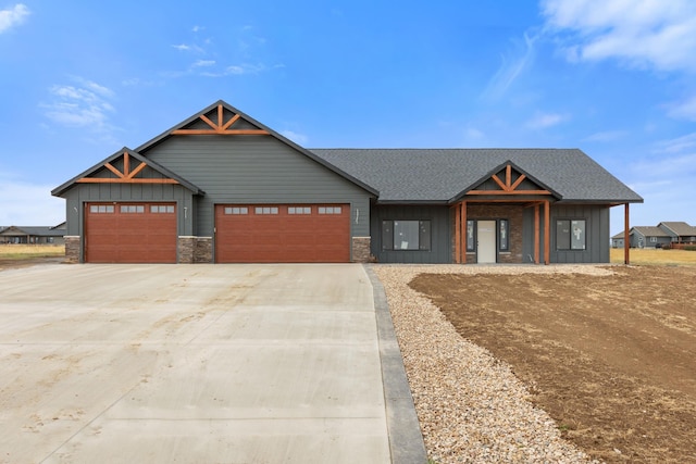 craftsman house featuring a garage