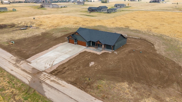 bird's eye view with a rural view