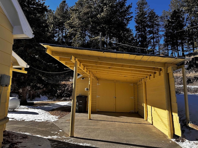 133 Pine Ave, Hill City, SD 57745 - view of patio with a carport and heating fuel