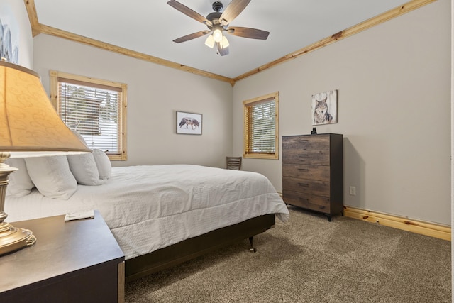 bedroom featuring crown molding, ceiling fan, and carpet flooring