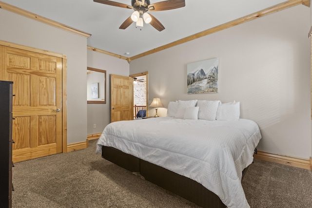 bedroom featuring baseboards, carpet floors, ceiling fan, and crown molding