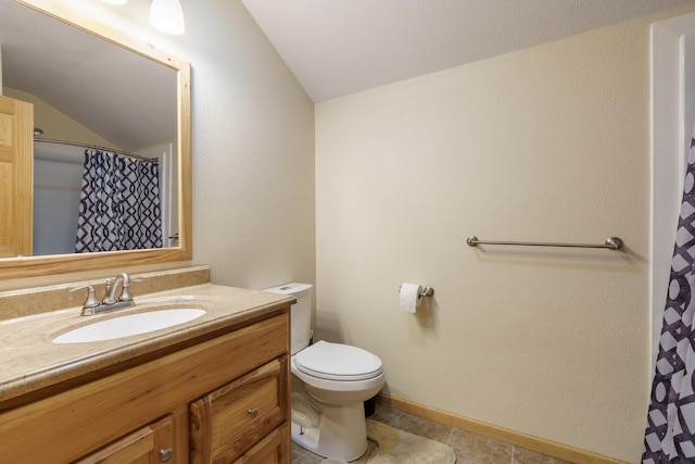 bathroom featuring tile patterned floors, toilet, vaulted ceiling, vanity, and a shower with shower curtain