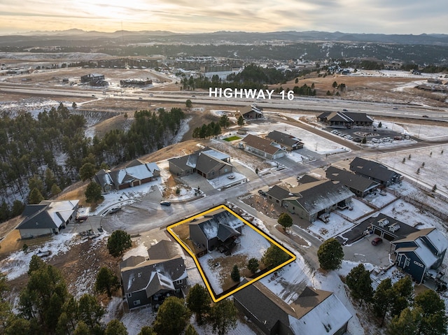 aerial view at dusk with a residential view