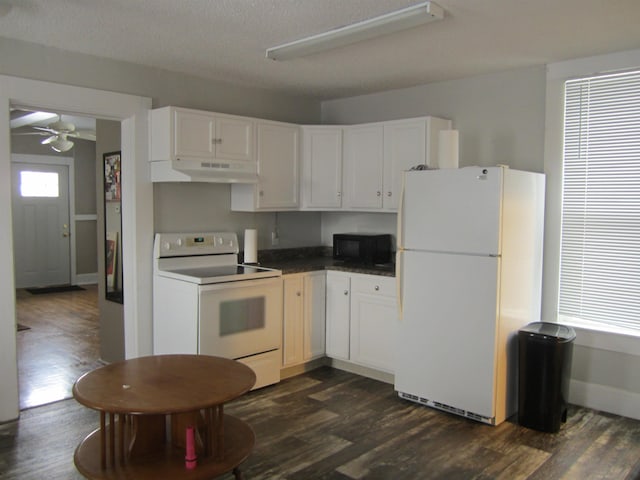 kitchen with white cabinetry, dark hardwood / wood-style flooring, white appliances, ceiling fan, and a textured ceiling